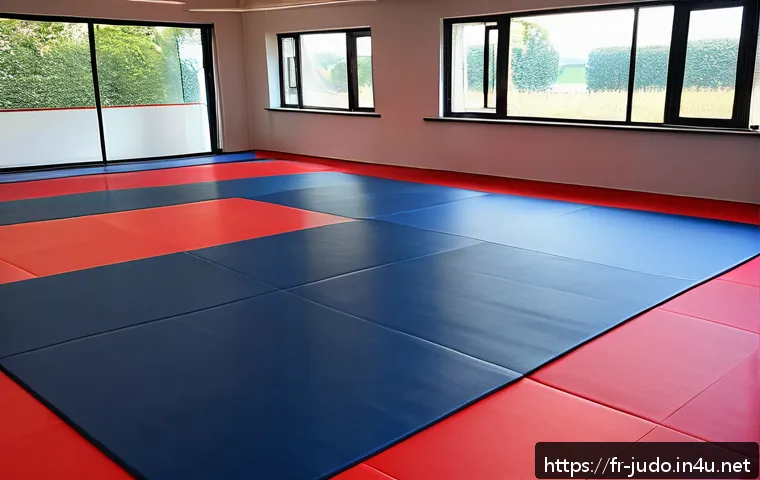 유도 선호 매트 브랜드 - A high-density judo mat setup in a modern French dojo, showcasing a close-up of textured, anti-slip ...